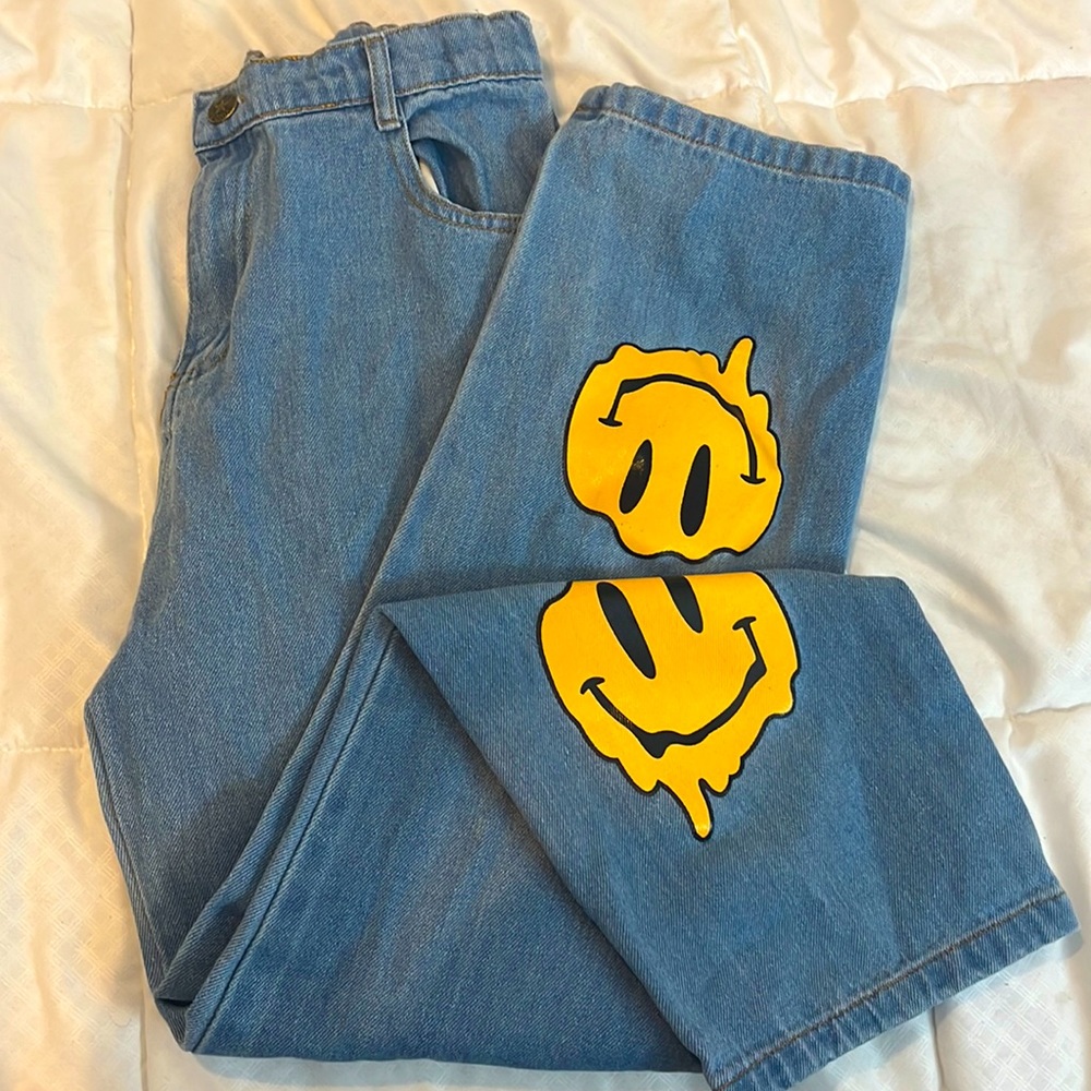 Cute straight leg, streetwear pants with smiley faces on the back.